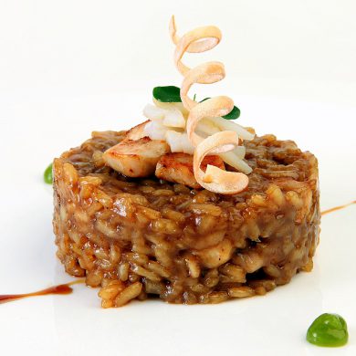 Receta de Arroz meloso de conejo y chipirón