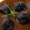 Caprichos de cerdo en reducción de vino tinto