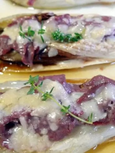 Endibias rellenas de carpaccio de buey y queso parmesano