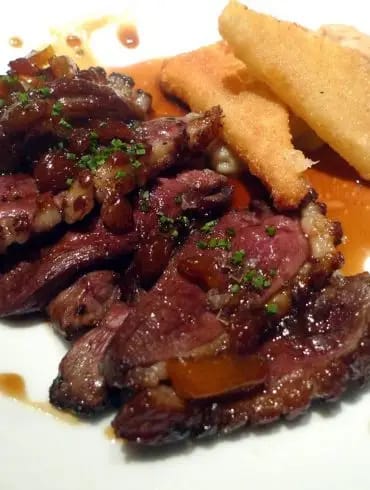 Magret con crema de champiñones