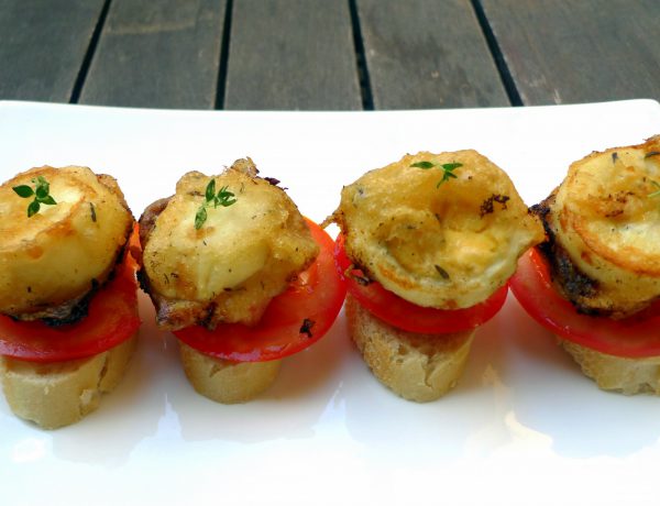 Aperitivo de huevo, queso y jamón en tempura