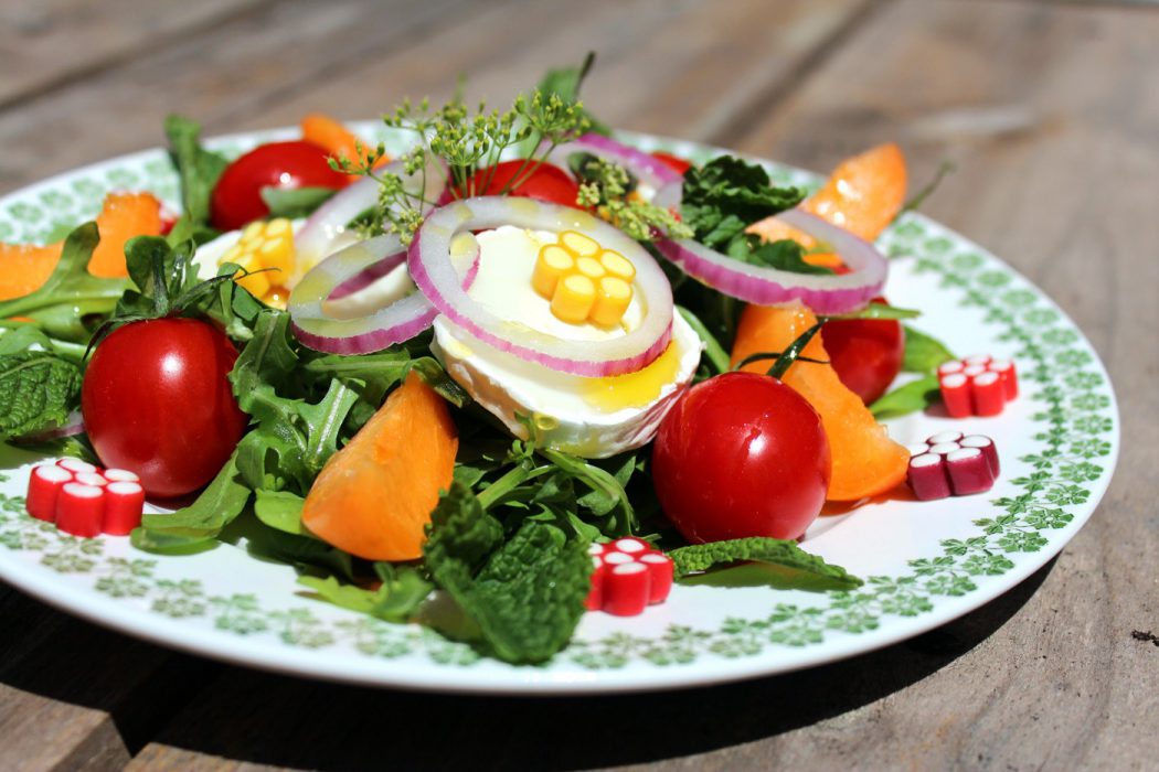 ensalada de rúcula y queso de cabra