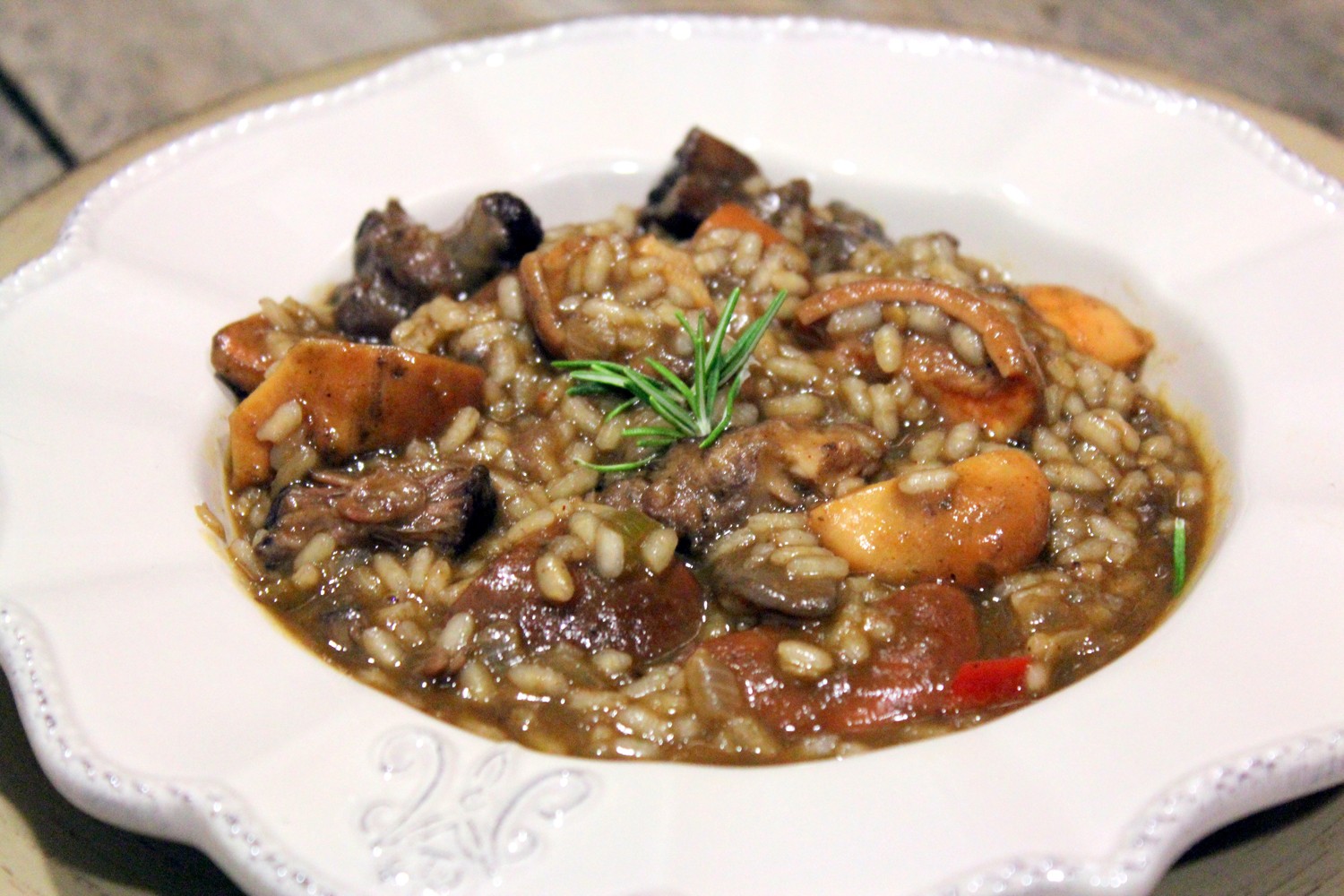 Arroz con níscalos y rabo guisado