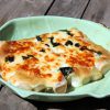 Puerros gratinados con alioli y queso curado