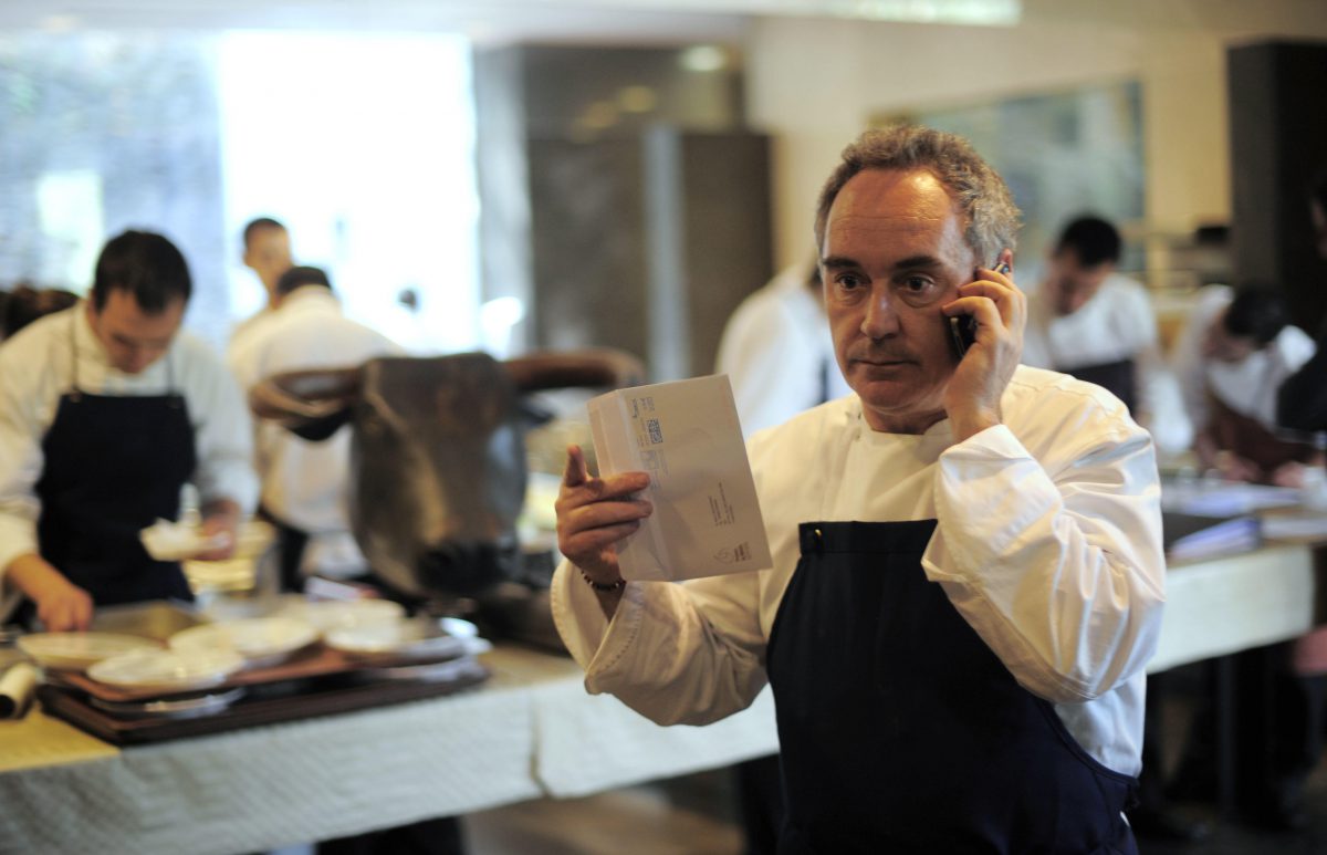 Ferran Adria speaks on the phone in his restaurant elBulli